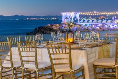Elegant seaside wedding dining setup at Villa Premiere Boutique Hotel & Romantic Getaway