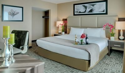 tray of wine on a hotel bed