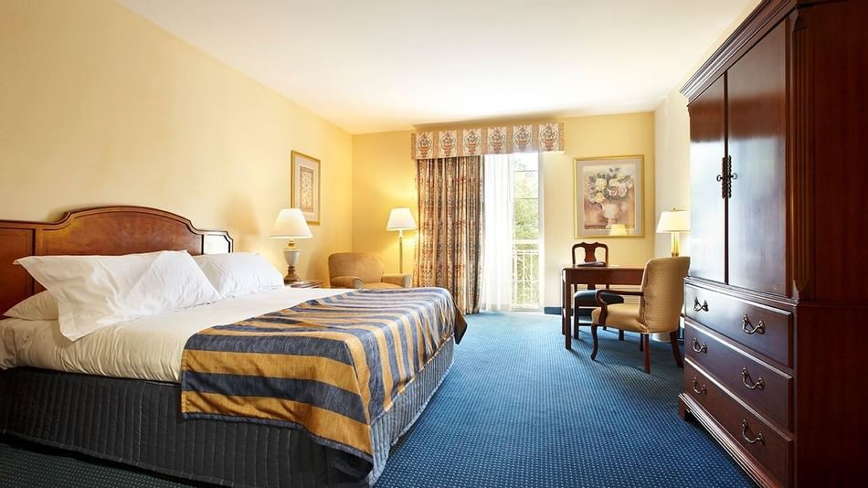 King bed & desk in Standard Guest Rooms at Trianon Bonita Bay