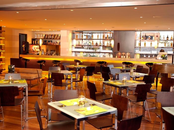 Interior of Bar café with dining area at Bogotá Plaza Hotel