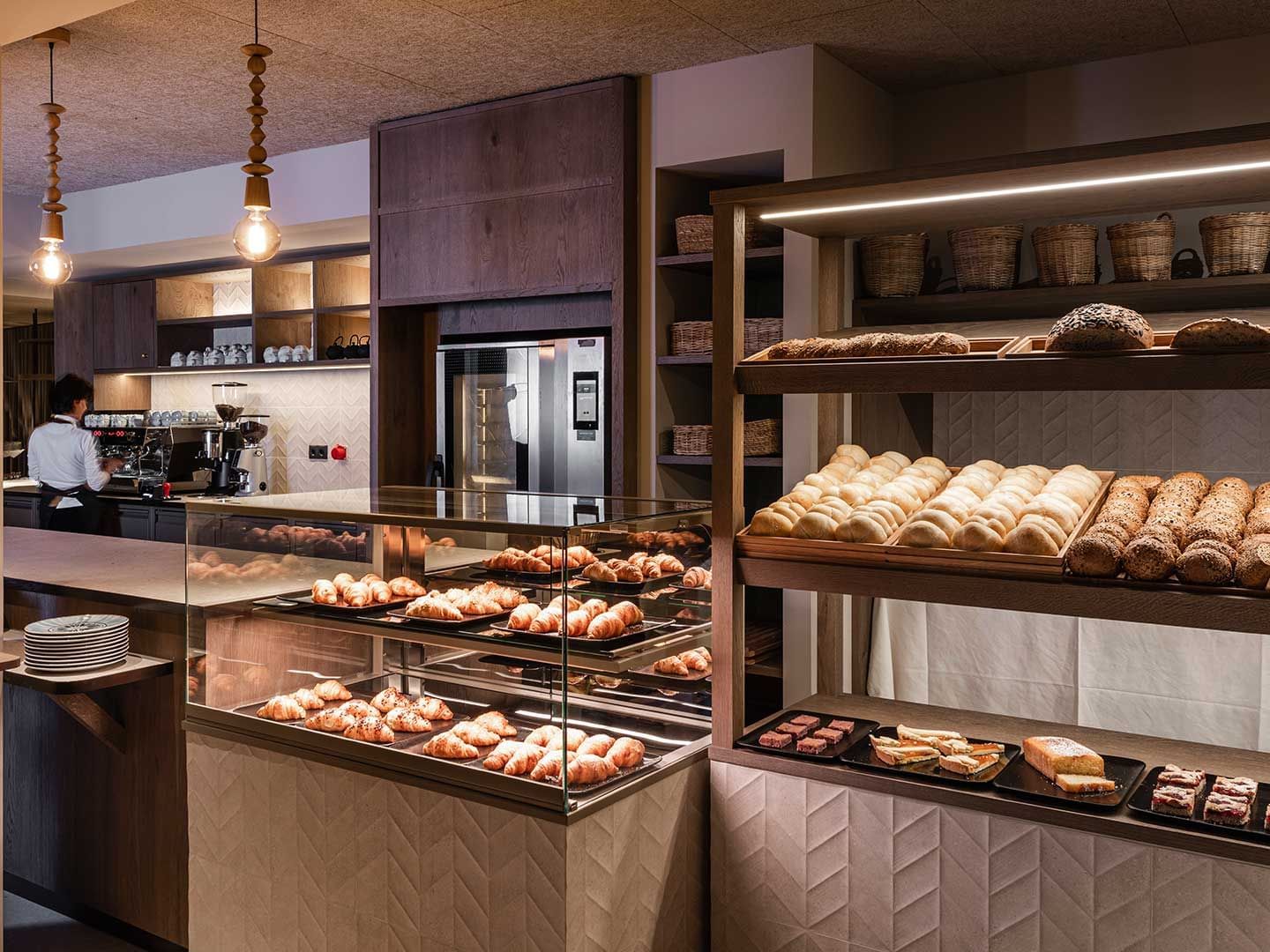 Baked products in shelves at Italian Bar, Falkensteiner Hotels