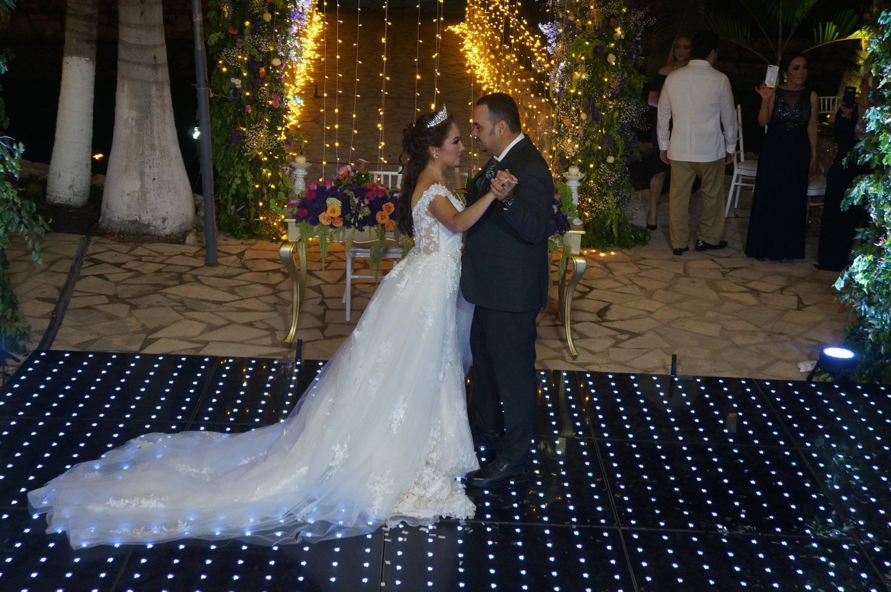 a bride and groom dancing