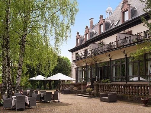 Outdoor dining area at Domaine de Beaupre Hotel