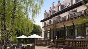 Outdoor dining area at Domaine de Beaupre Hotel