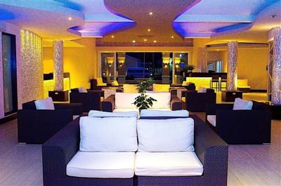 Interior view of a lounge area with comfy sofa's at Accra Beach Hotel & Spa