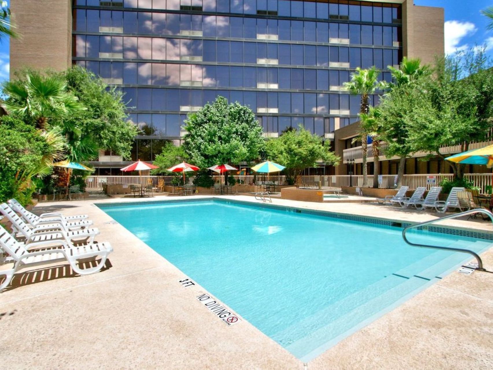 Outdoor pool area at MCM Elegante Hotel Odessa