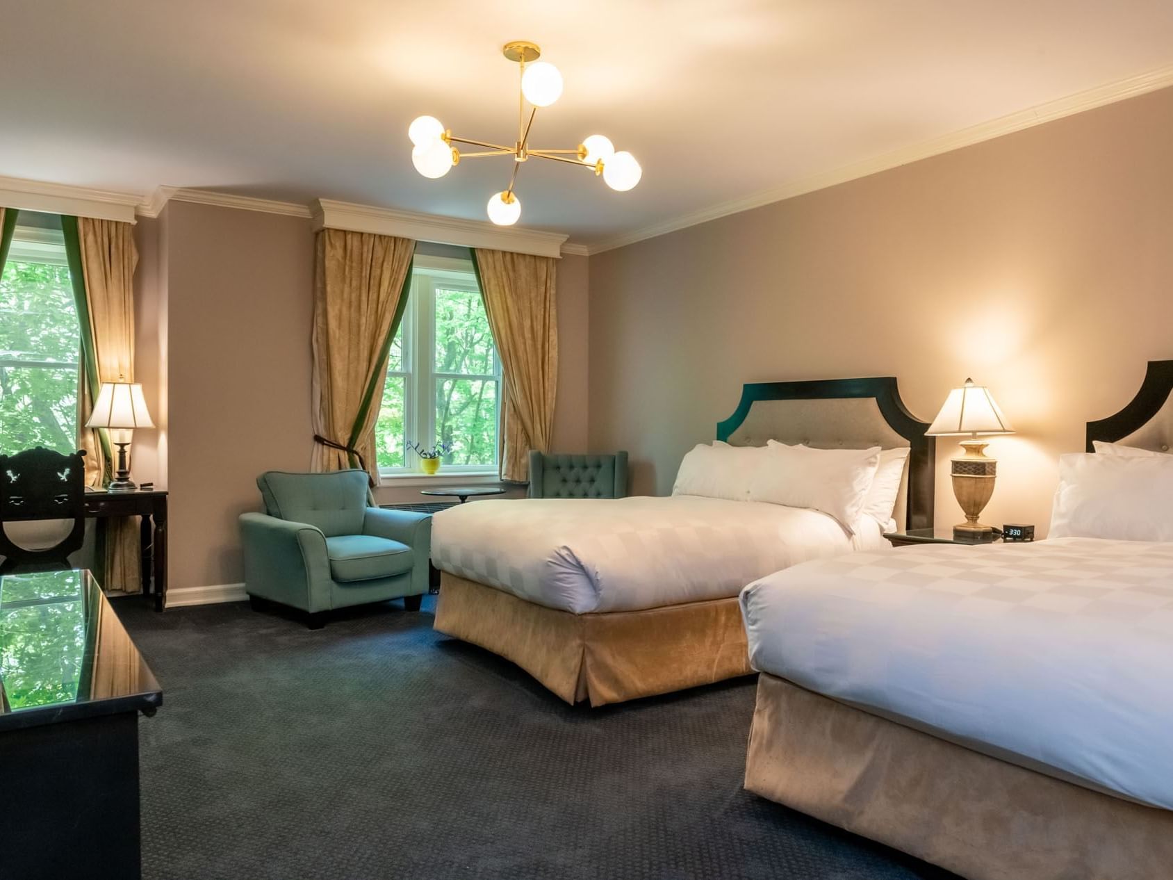 Beds in Premier Double Queen Room at Castle Hotel and Spa