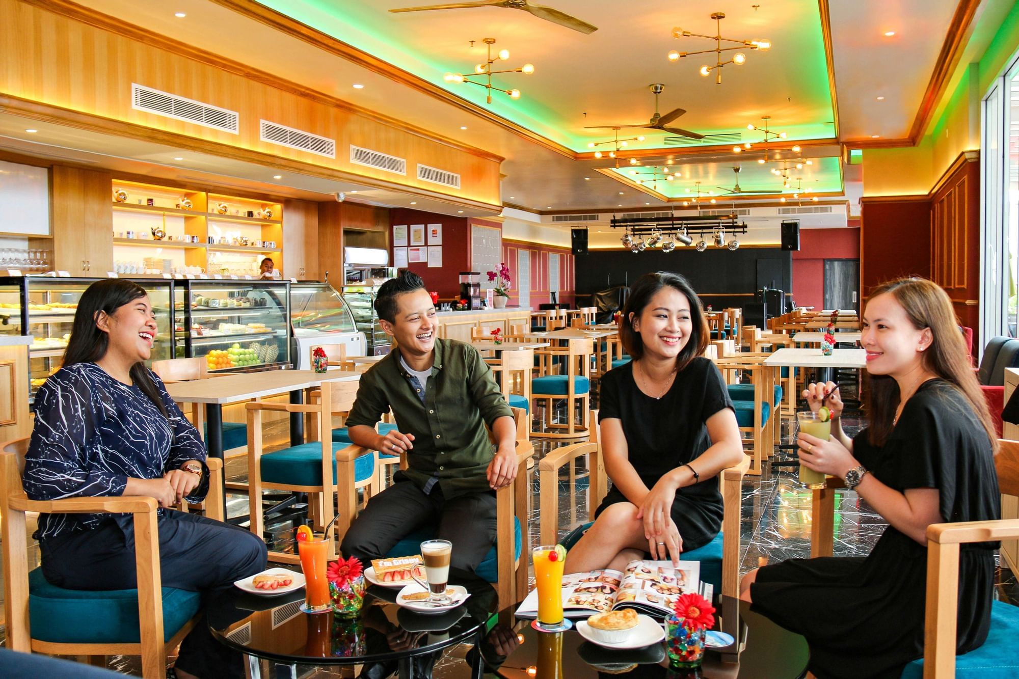 People enjoying food at a cafe in Port Dickson