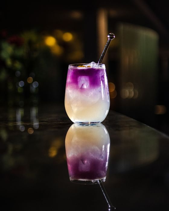 Experimental purple gin cocktail at the May Fair Bar, Edwardian Hotels Group