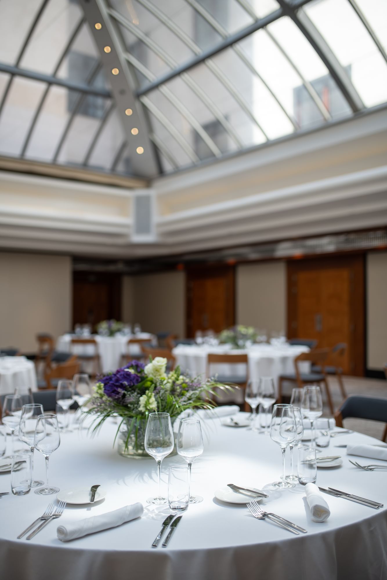 Banquet tables arranged with flowers at Almanac X Alcron Prague, Fine Dining Prague