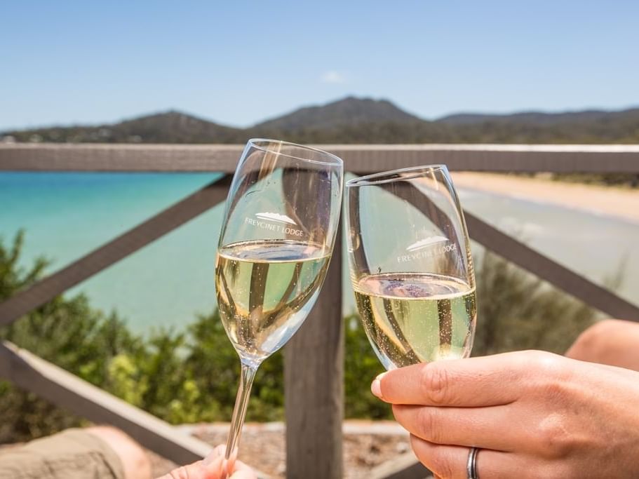 Close up on two champagne glasses at the Freycinet Lodge
