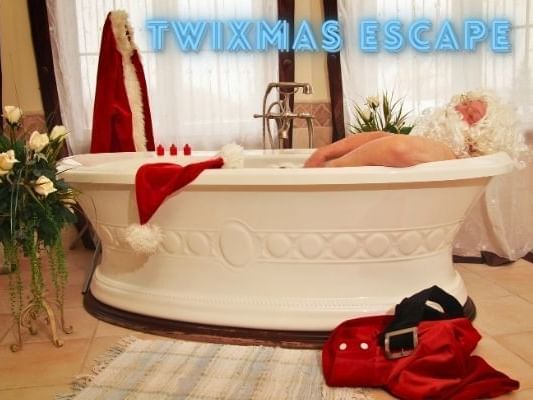 Twixmas Breaks UK featuring Santa Claus relaxing in the bath
