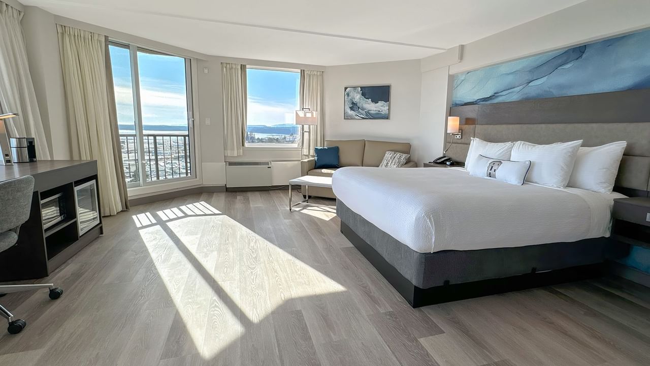 Hotel guestroom with a king bed