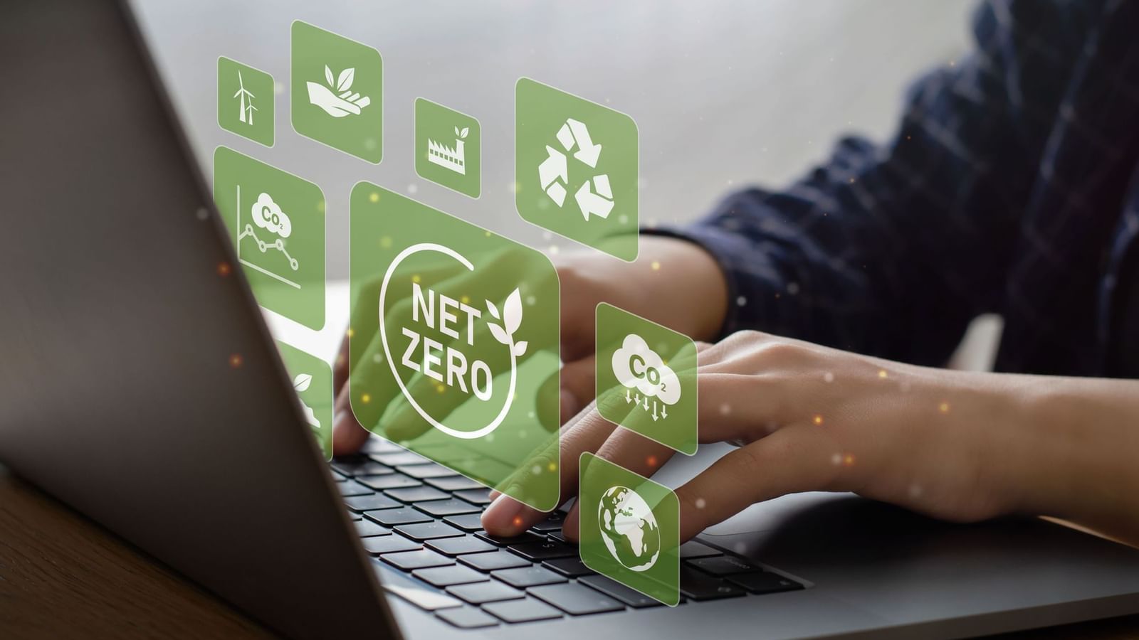 Close-up of man typing on a keyboard at Legacy Vacation Resorts