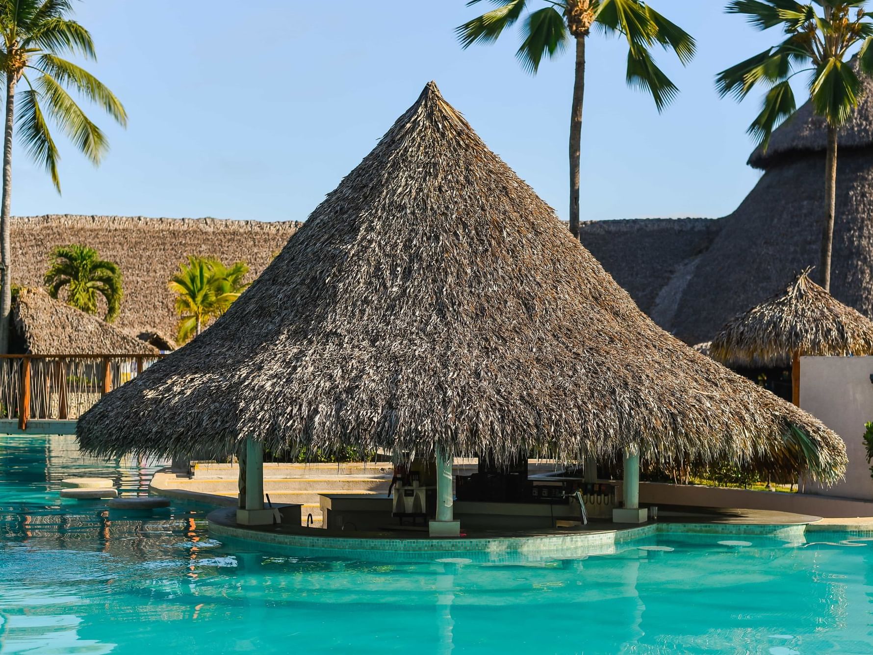 El Pargo Aquatic Bar with an outdoor pool at Fiesta Resort