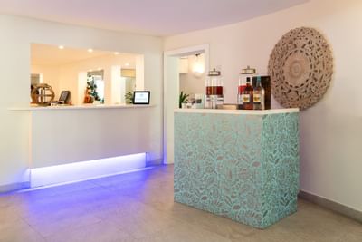 Front desk with the Rum punch station at Sugar Bay Barbados