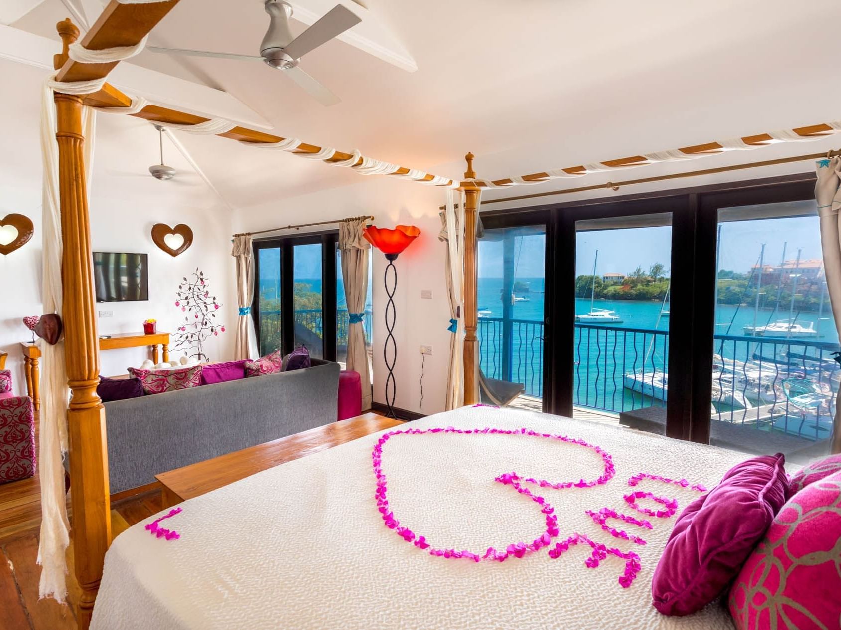 Petals on the bed in Honey Bee Suite at True Blue Bay Resort