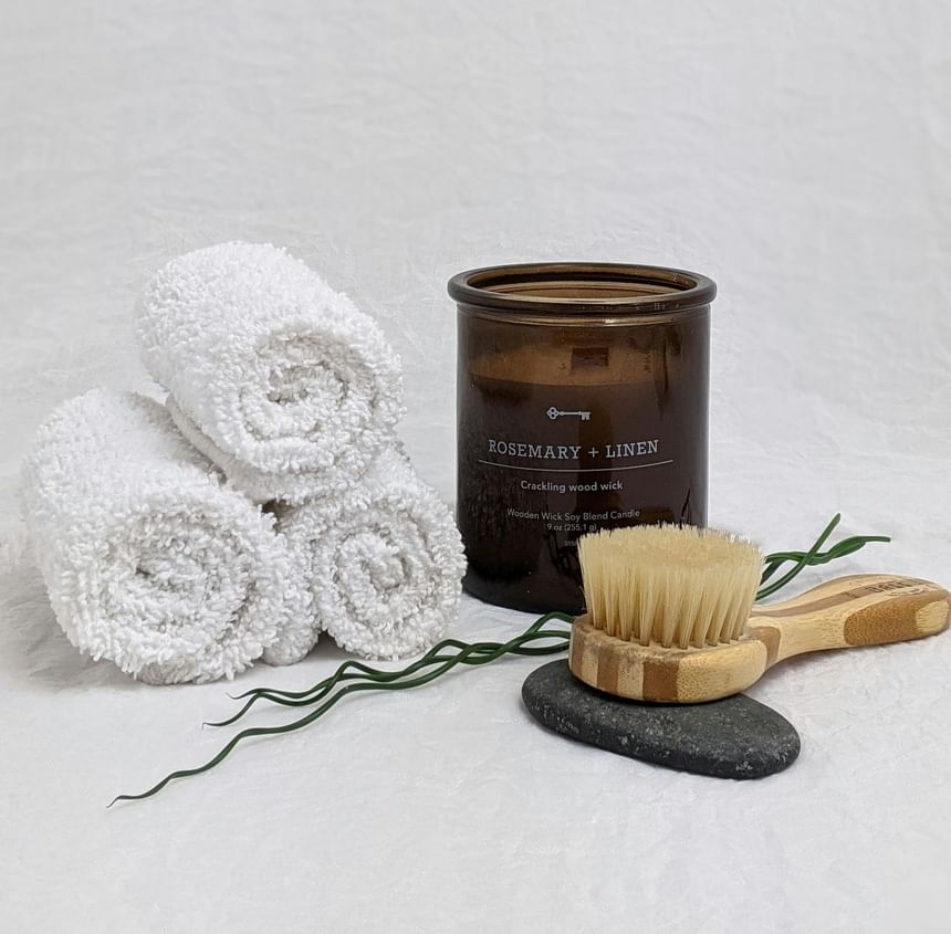 Close-up of spa kit with towels and a brush in Arbor Spa at Hotel Brookmere