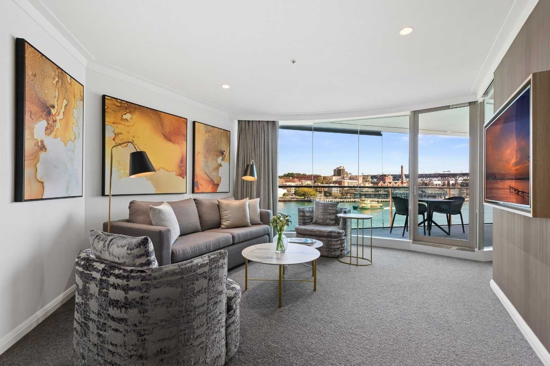 Living area of Deluxe 1 bed suite at Pullman Quay Grand Sydney 