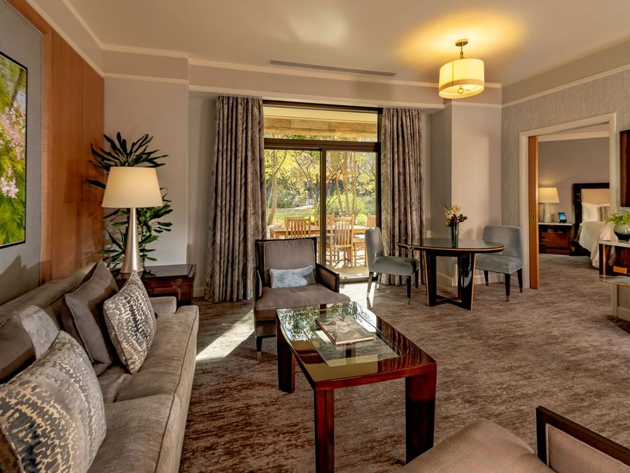 Spacious Livingroom area with original artwork in Signature Spa Level Suite at The Umstead Hotel and Spa
