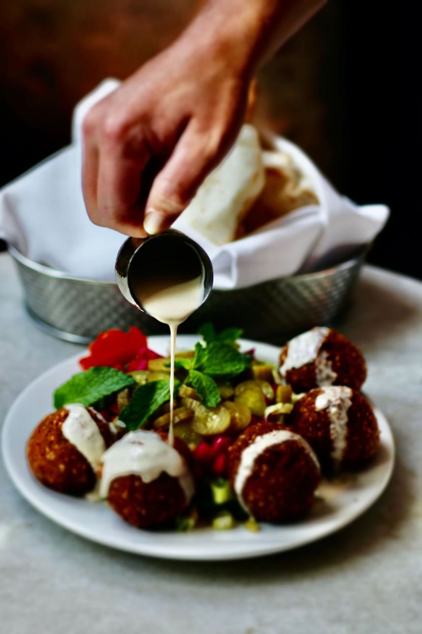 Falafel with gravy served in FIGS Restaurant at Hotel Jackson