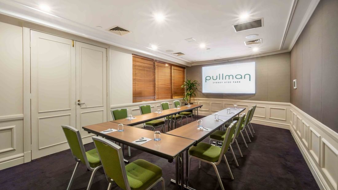 UShape set-up with projector screen in Dalley Room at Pullman Sydney Hyde Park