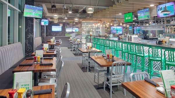 Dining area of Drive Shack Orlando near Lake Buena Vista Resort Village & Spa