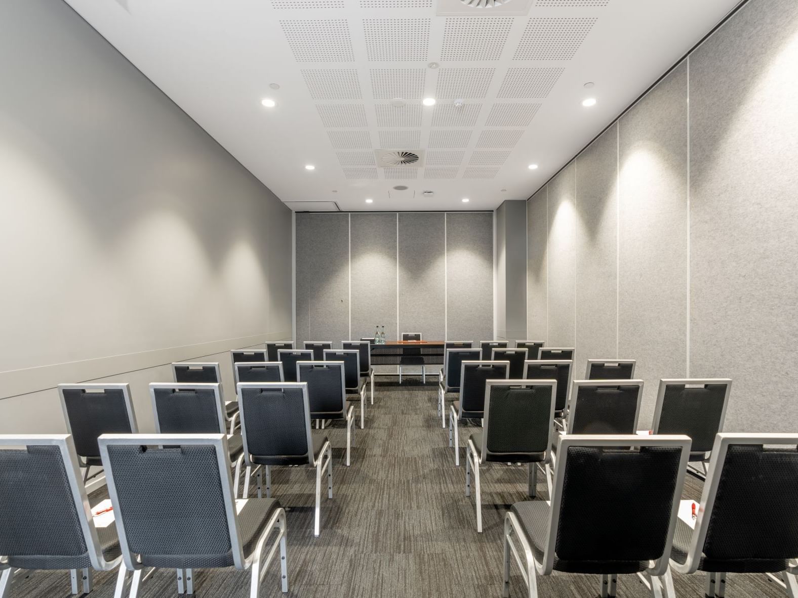 Modern seminar and training room in Brisbane with theatre-style seating and conference facilities at Hotel Grand Chancellor Brisbane.