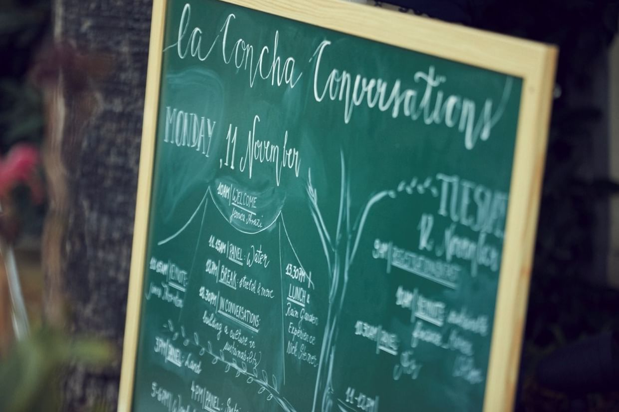 Chalkboard displaying the La Concha Conversations event schedule for Monday, 11 November at Marbella Club