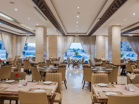 Dining area in Royal Restaurant at Warwick Hotels & Resorts