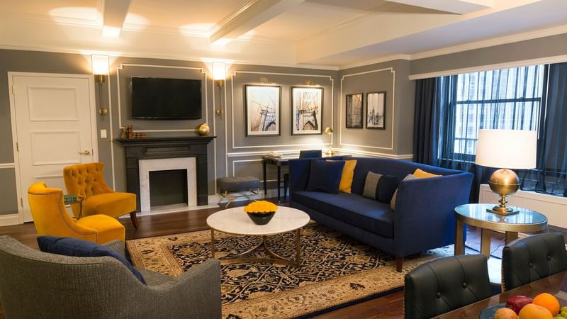 TV lobby with couches in Randolph Suite at Warwick New York