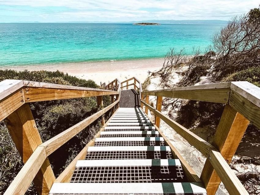 Stairway view of the Bay on a sunny day near Freycinet Lodge