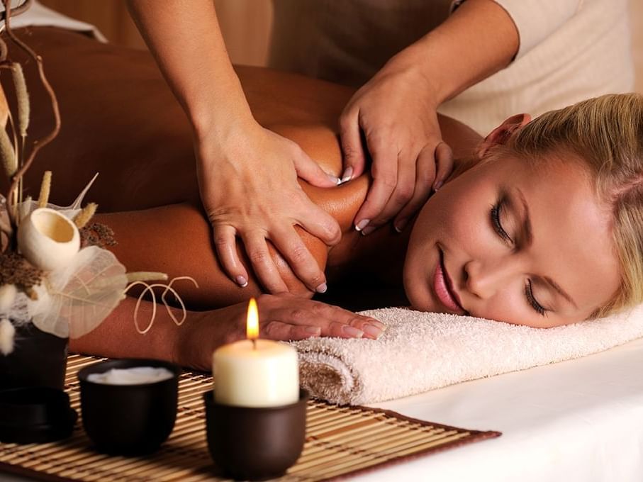 Woman getting massage in Spa & Healing Getaway at Honor’s Haven
