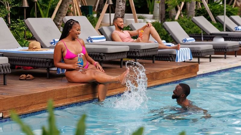 people enjoying the swimming pool