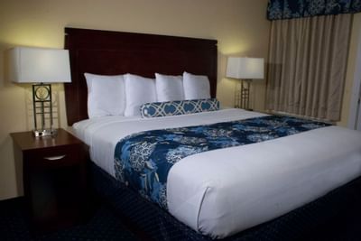 guest room with bed and nightstands