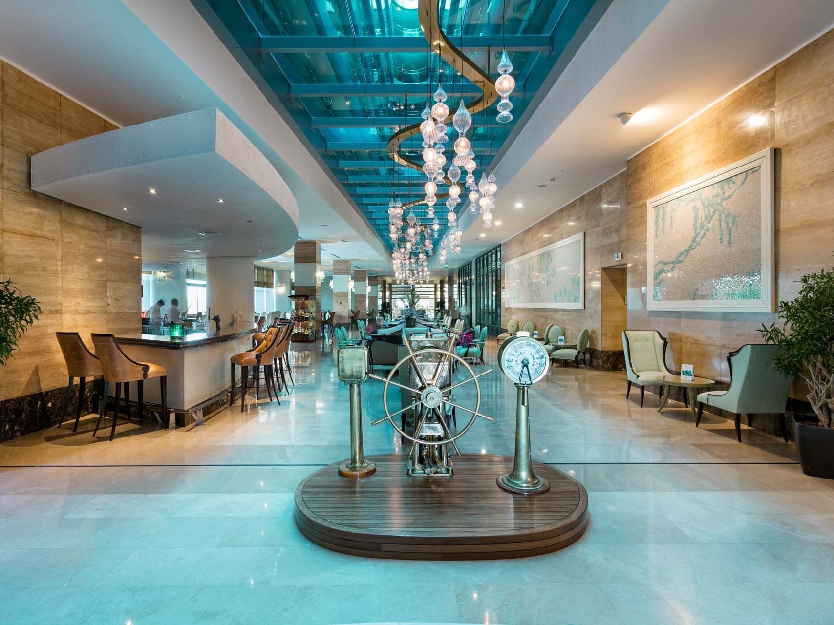 Interior of Caprice Lobby Bar with seating area at Titanic Deluxe Lara