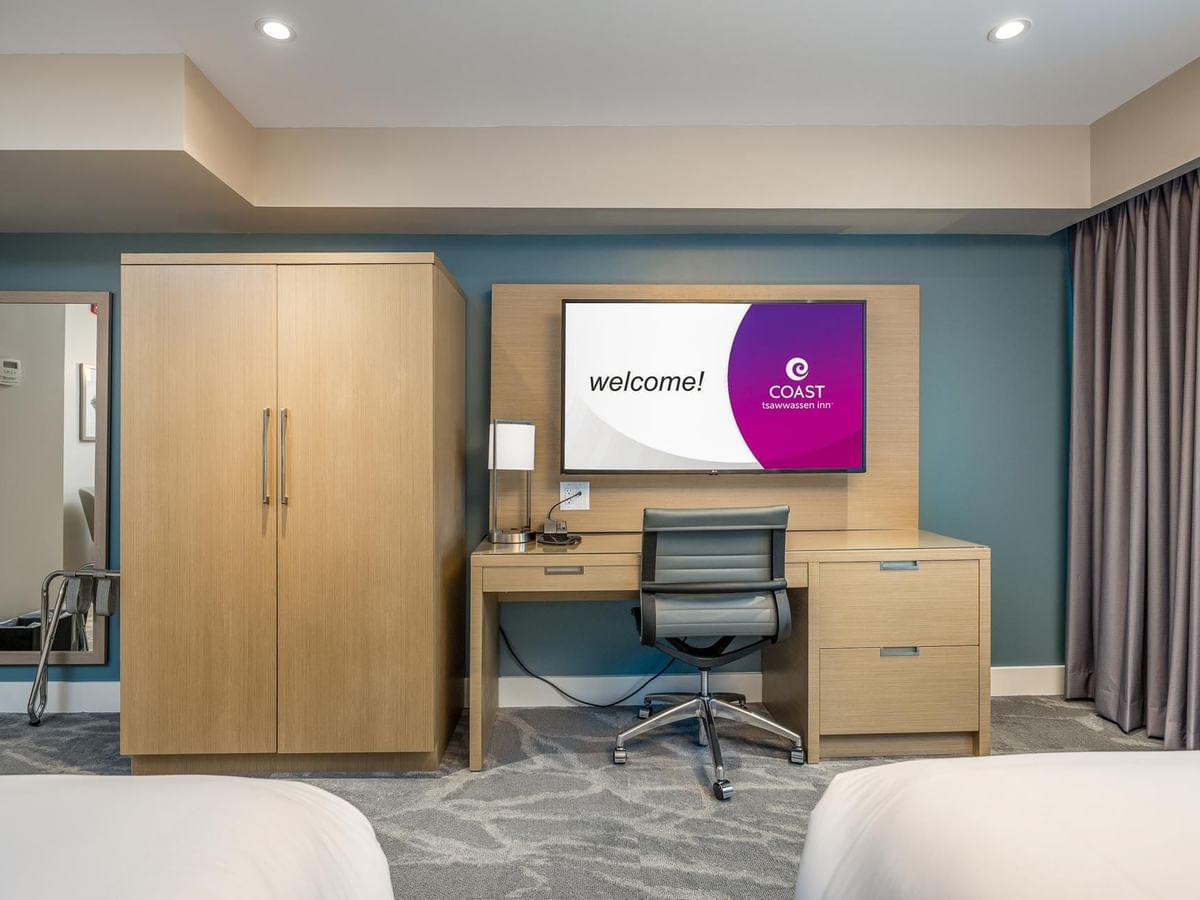 Work desk and tv in our Coast Accessible Two Queens Bedroom