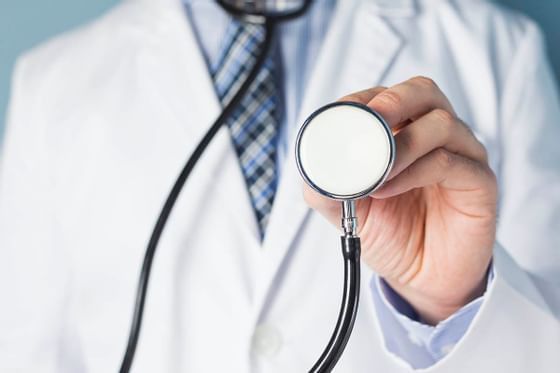 Close-up of doctor holding stethoscope at Buenaventura Grand Hotel and Spa