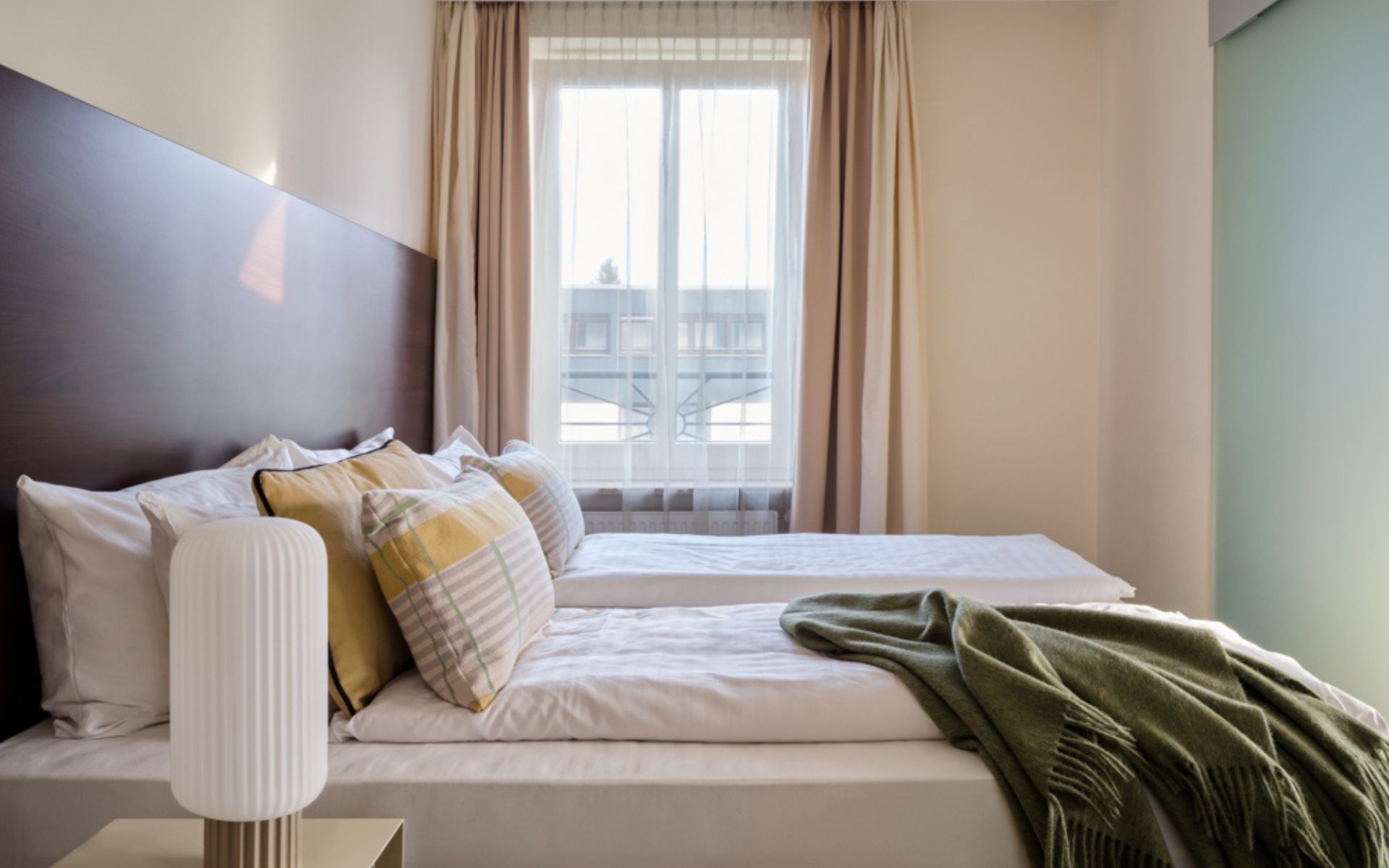 Double bed in Signature Room at Flemings Hotel Munchen