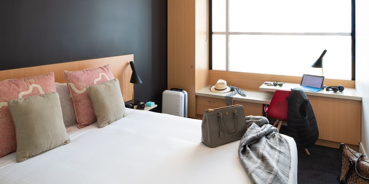 Bedroom of a guest room at ibis Sydney World Square hotel