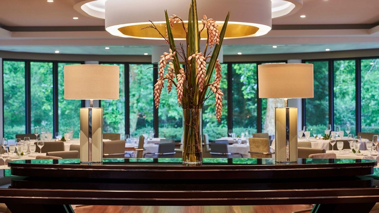 Dining table arrangement in illuminated TN Restaurant at Terra Nostra Garden Hotel