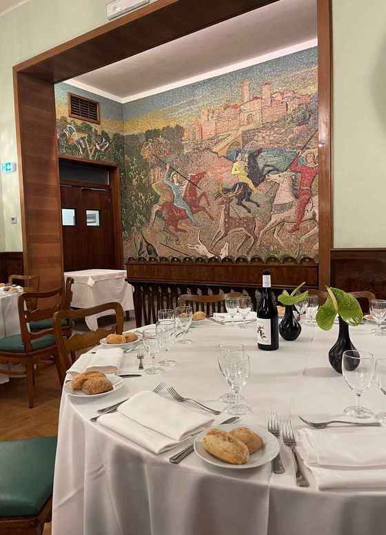 Round Table with Wine & Bread served in Sala Mosaico Restaurant at Bettoja Hotel Atlantico