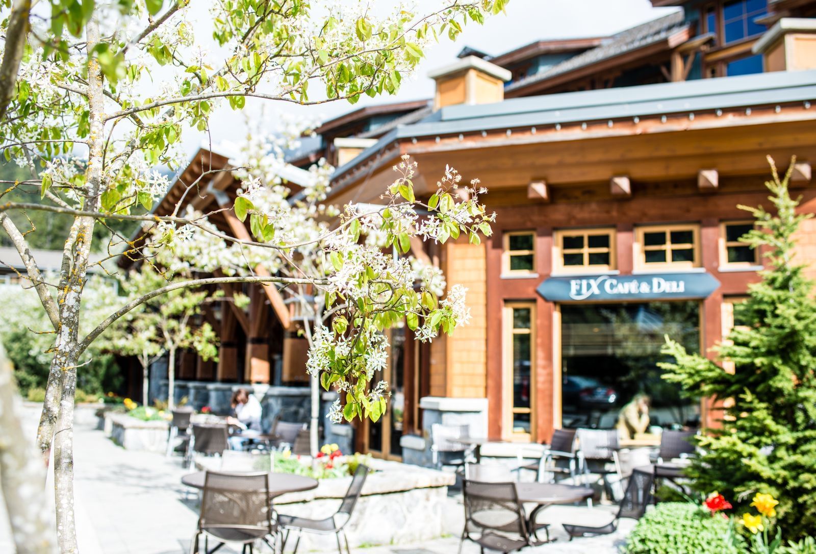 Dining area & hotel exterior at Nita Lake Lodge