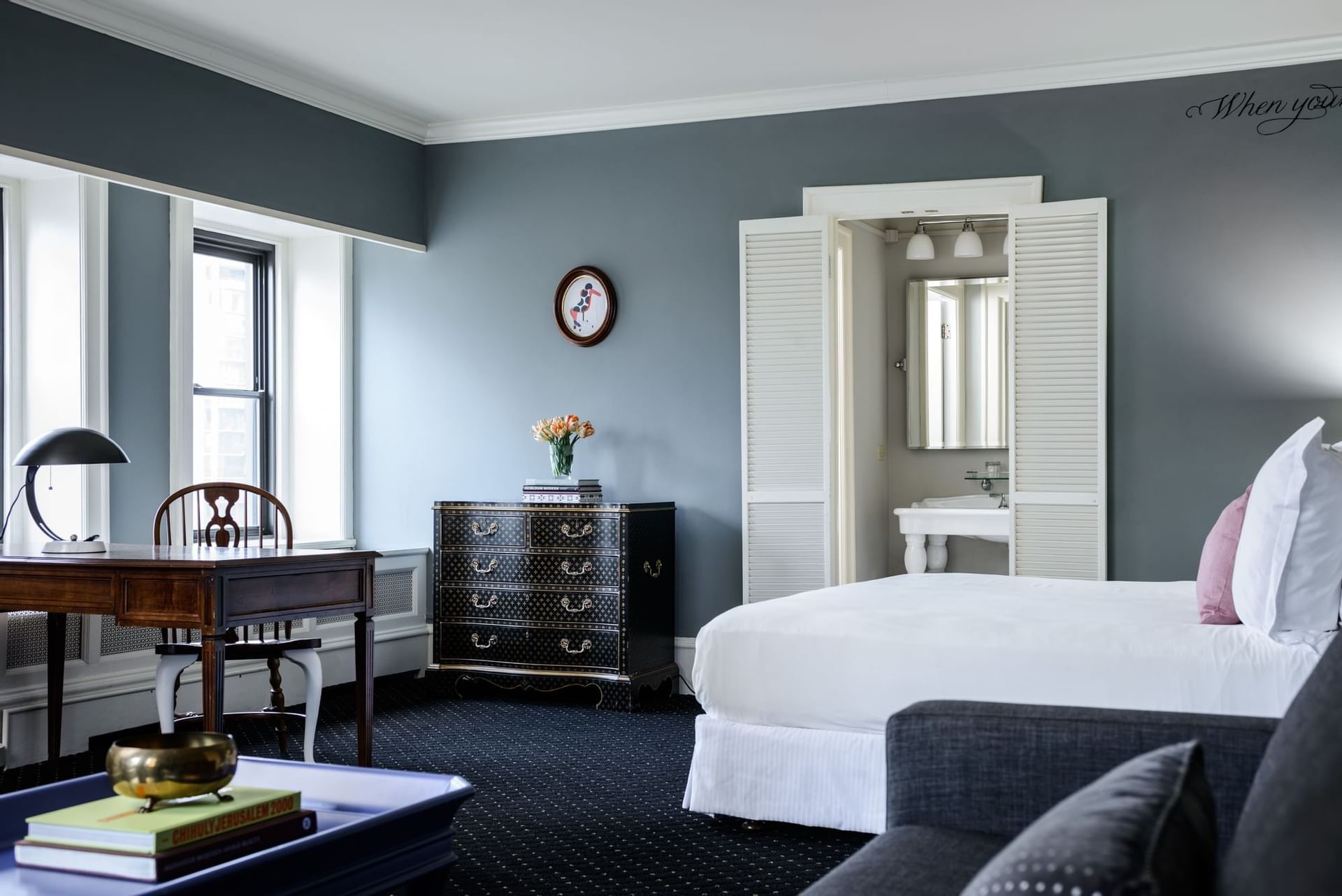 Interior of Ravello Studio Suite with a table at Hotel Sorrento