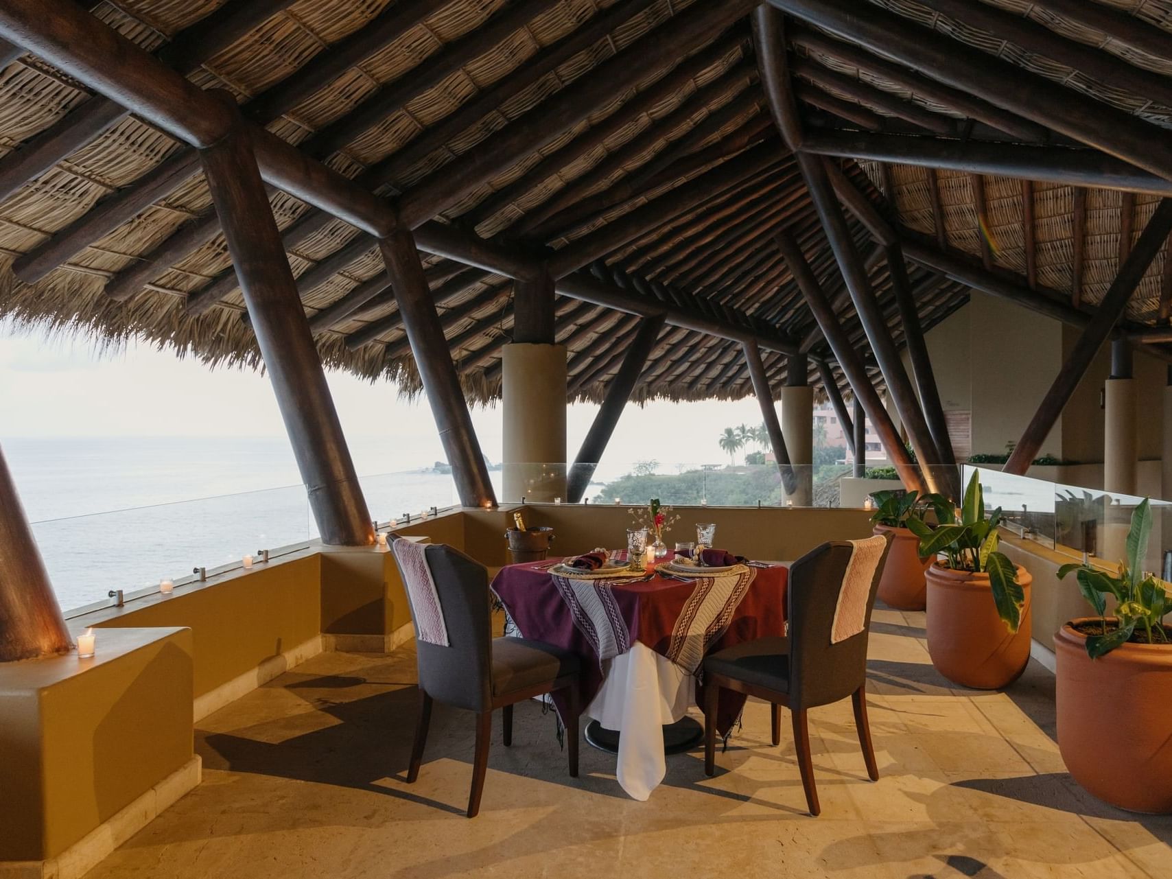 Dining table arranged in the Rooftop Deck at Cala de Mar Resort