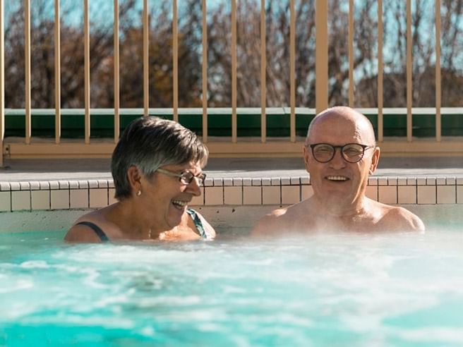 Elderly couple relaxing in a hot tub at Temple Gardens Hotel & Spa