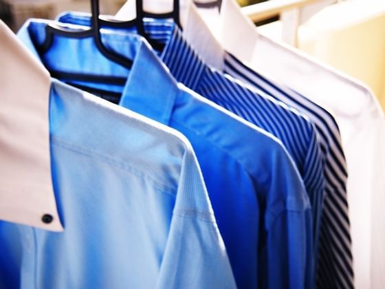 men's dress shirts on hangers