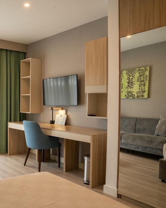 Workspace with TV and seating area in Double Room at The Hub Acunmeyda