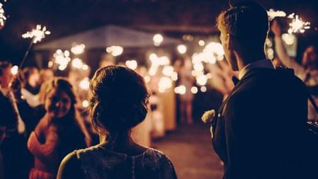 Wedding reception at night with sparklers