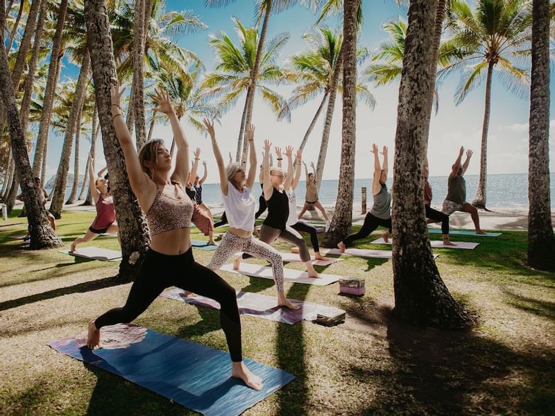 Ladies doing Yoga, Pullman Palm Cove Sea Temple Resort & Spa